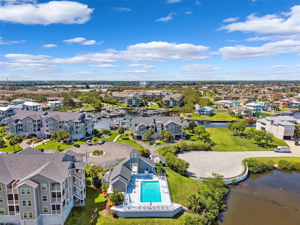 5712 Biscayne Court, Unit 103 New Port Richey, FL 34652 - Photo 27 of 31 an aerial view of residential houses with outdoor space