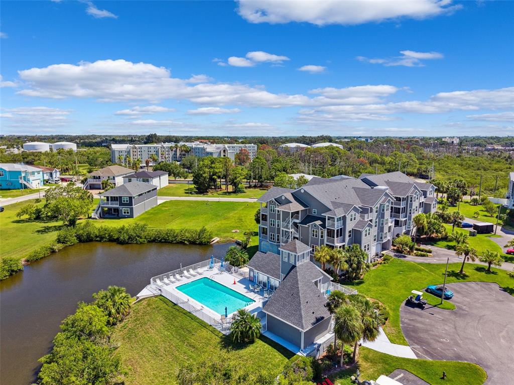 5712 Biscayne Court, Unit 103 New Port Richey, FL 34652 - Photo 28 of 31 an aerial view of a house with a garden