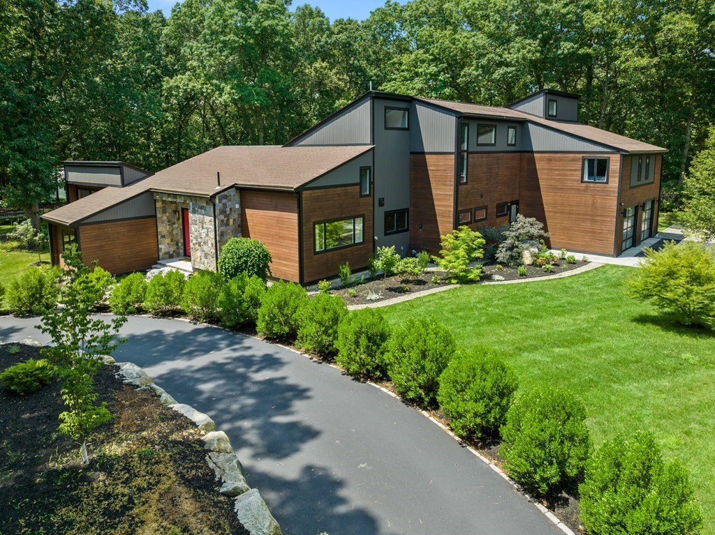 21 Wits End Road Weston, MA 02493 - Photo 1 of 1 a front view of a house with a yard