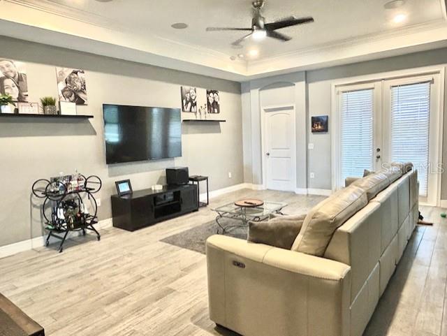 13850 Moosehead Circle Hudson, FL 34669 - Photo 14 of 71 a living room with furniture and a flat screen tv