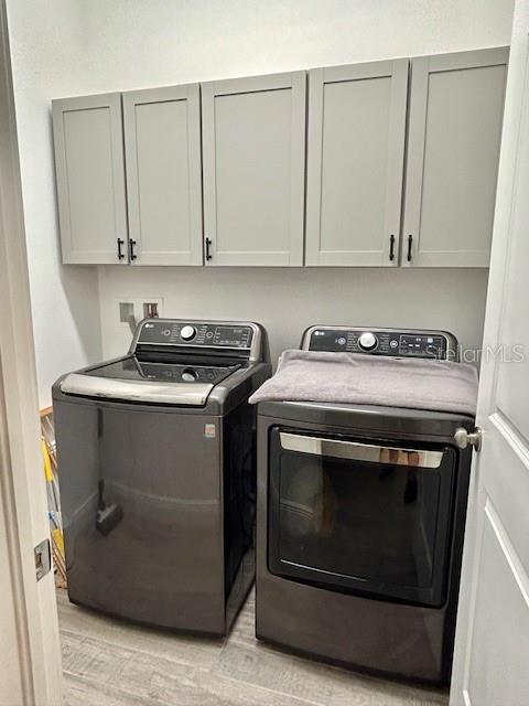 13850 Moosehead Circle Hudson, FL 34669 - Photo 18 of 71 a utility room with dryer and washer