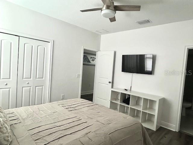 13850 Moosehead Circle Hudson, FL 34669 - Photo 29 of 71 a bedroom with a bed and a flat screen tv