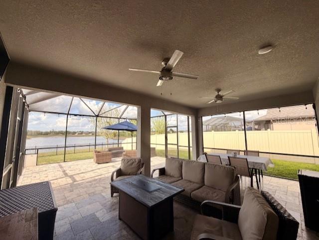13850 Moosehead Circle Hudson, FL 34669 - Photo 36 of 71 a living room with furniture and a large window