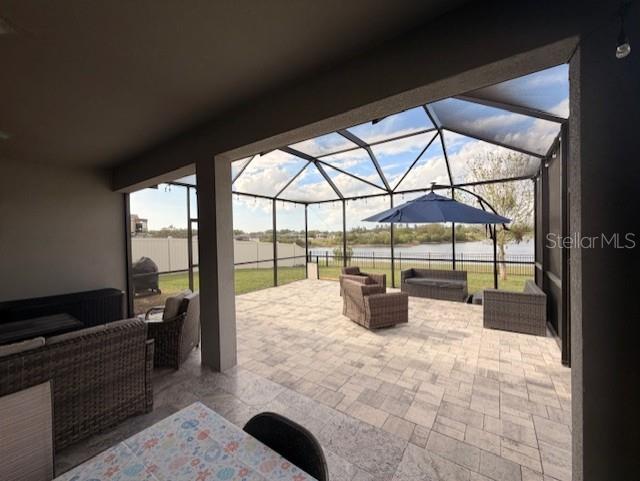 13850 Moosehead Circle Hudson, FL 34669 - Photo 37 of 71 a large bedroom with a large bed and a large window