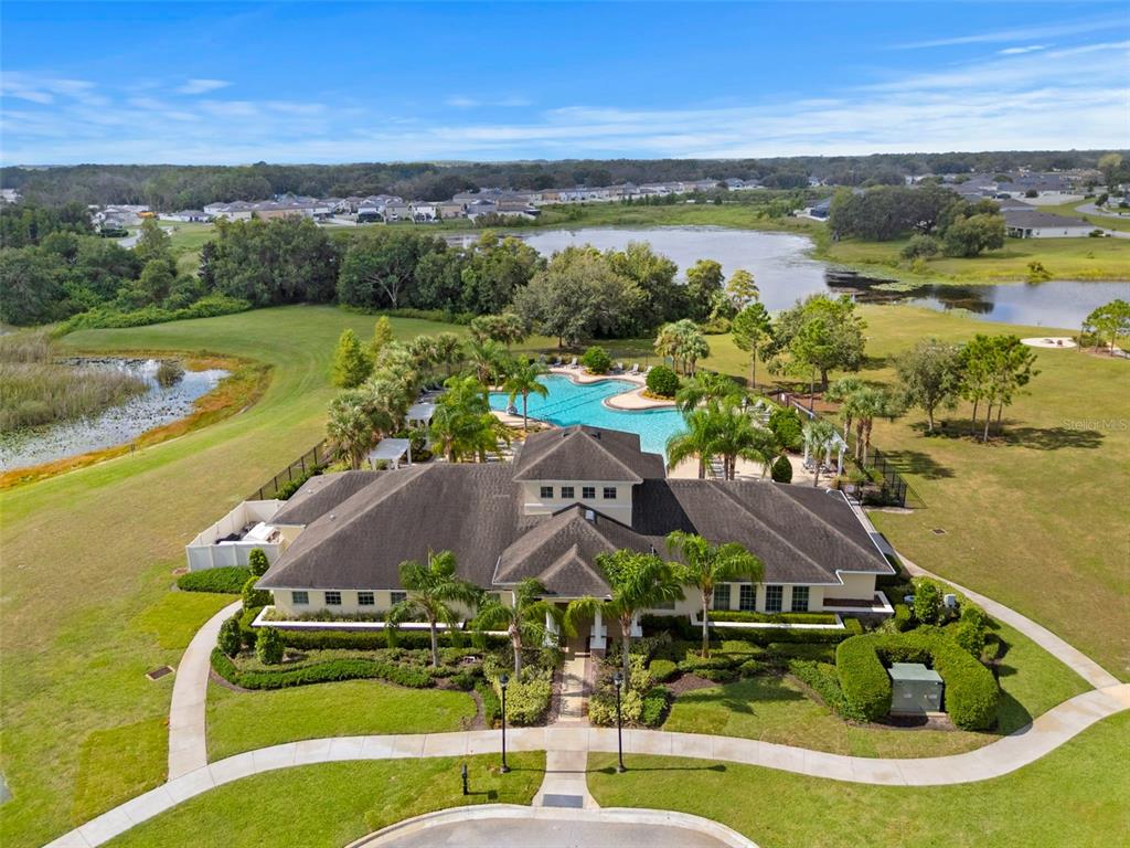 13850 Moosehead Circle Hudson, FL 34669 - Photo 45 of 71 an aerial view of residential houses with outdoor space