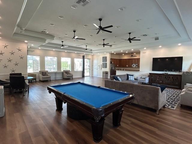 13850 Moosehead Circle Hudson, FL 34669 - Photo 53 of 71 a living room with furniture pool table flat screen tv and couches