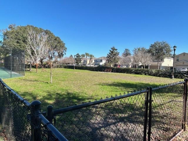 13850 Moosehead Circle Hudson, FL 34669 - Photo 66 of 71 a view of a tennis court
