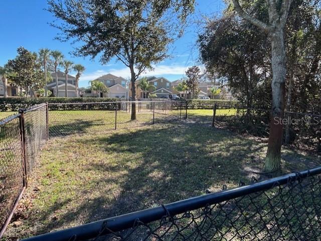 13850 Moosehead Circle Hudson, FL 34669 - Photo 67 of 71 a view of swimming pool with trees and sitting space
