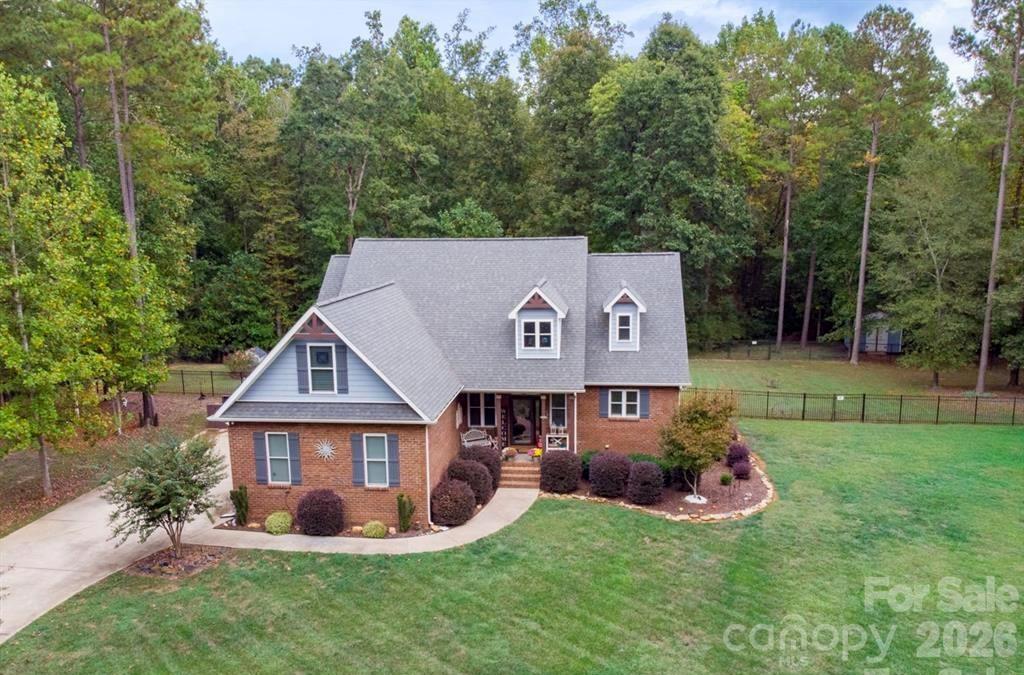 790 Brandon Road Clover, SC 29710 - Photo 6 of 43 a front view of a house with a yard and trees