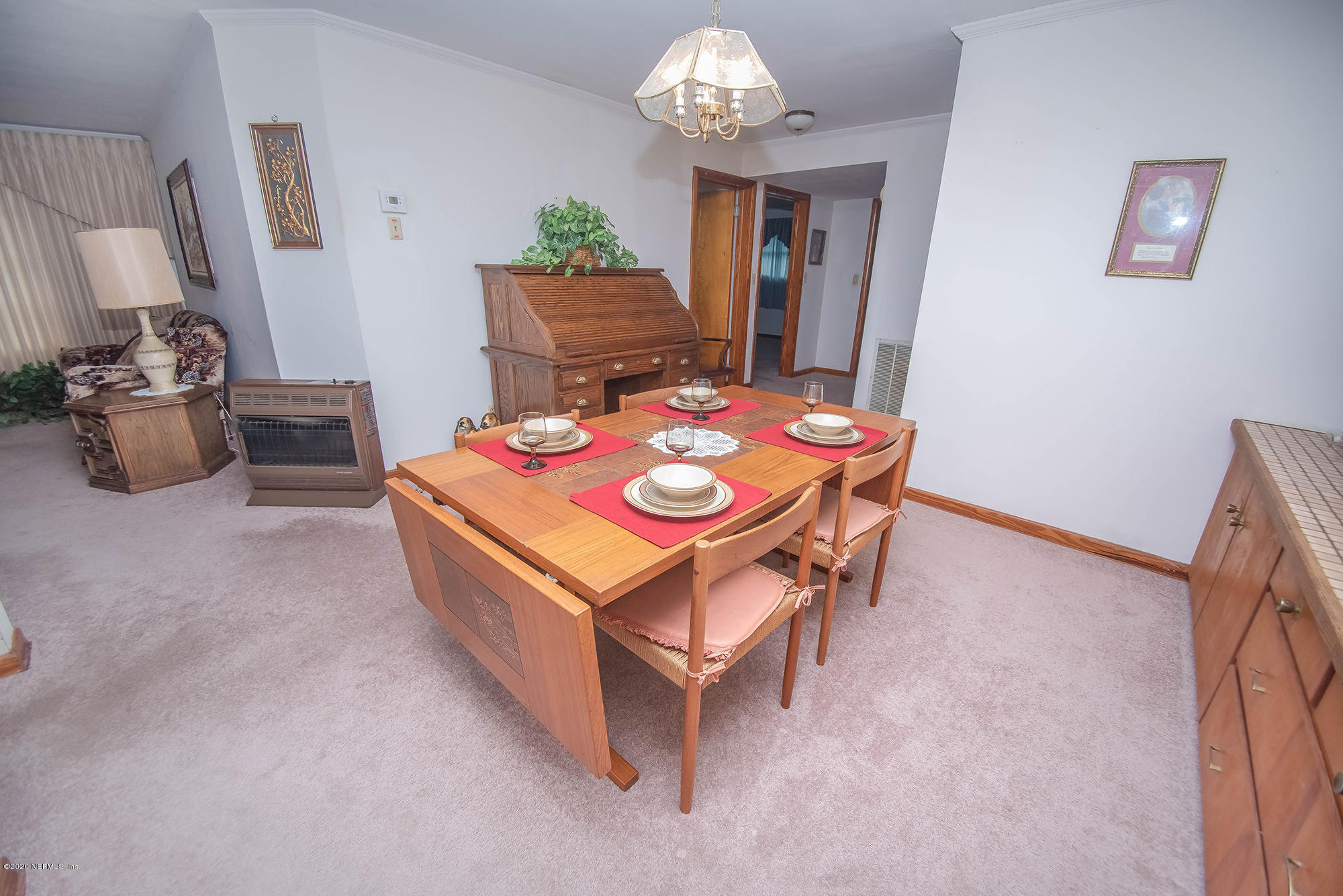 281105 Trigg Road Hilliard, FL 32046 - Photo 12 of 41 a room with table and chair