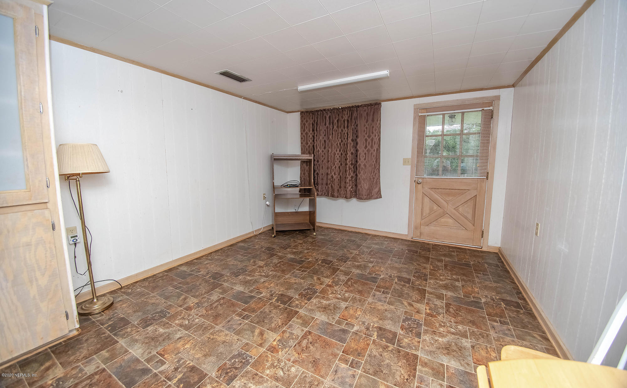 281105 Trigg Road Hilliard, FL 32046 - Photo 30 of 41 wooden floor in an empty room with a window