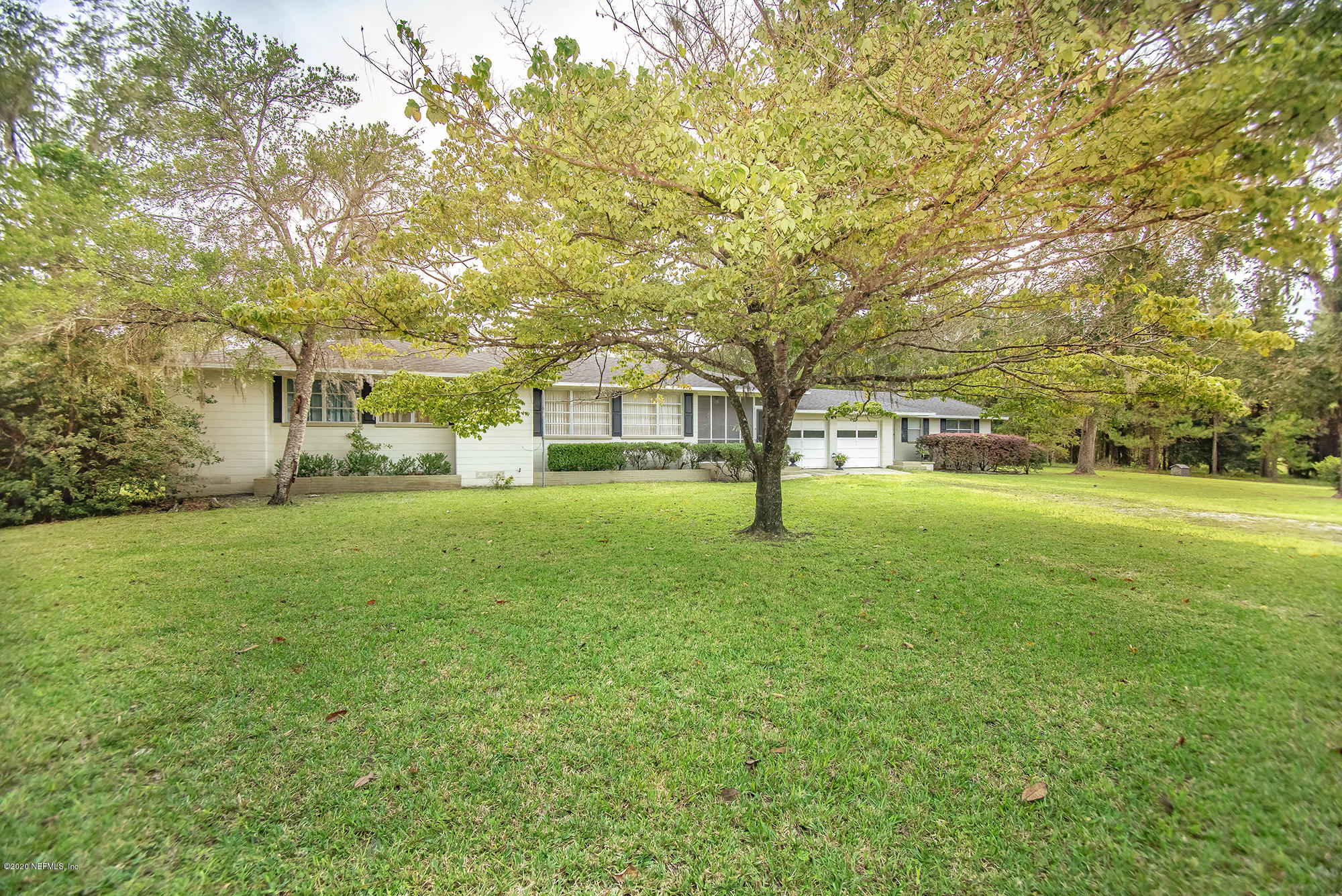 281105 Trigg Road Hilliard, FL 32046 - Photo 3 of 41 a view of yard with tree s