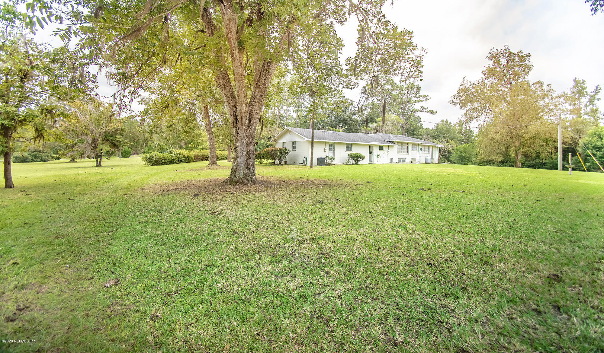 281105 Trigg Road Hilliard, FL 32046 - Photo 8 of 41 a view of an outdoor space and a yard