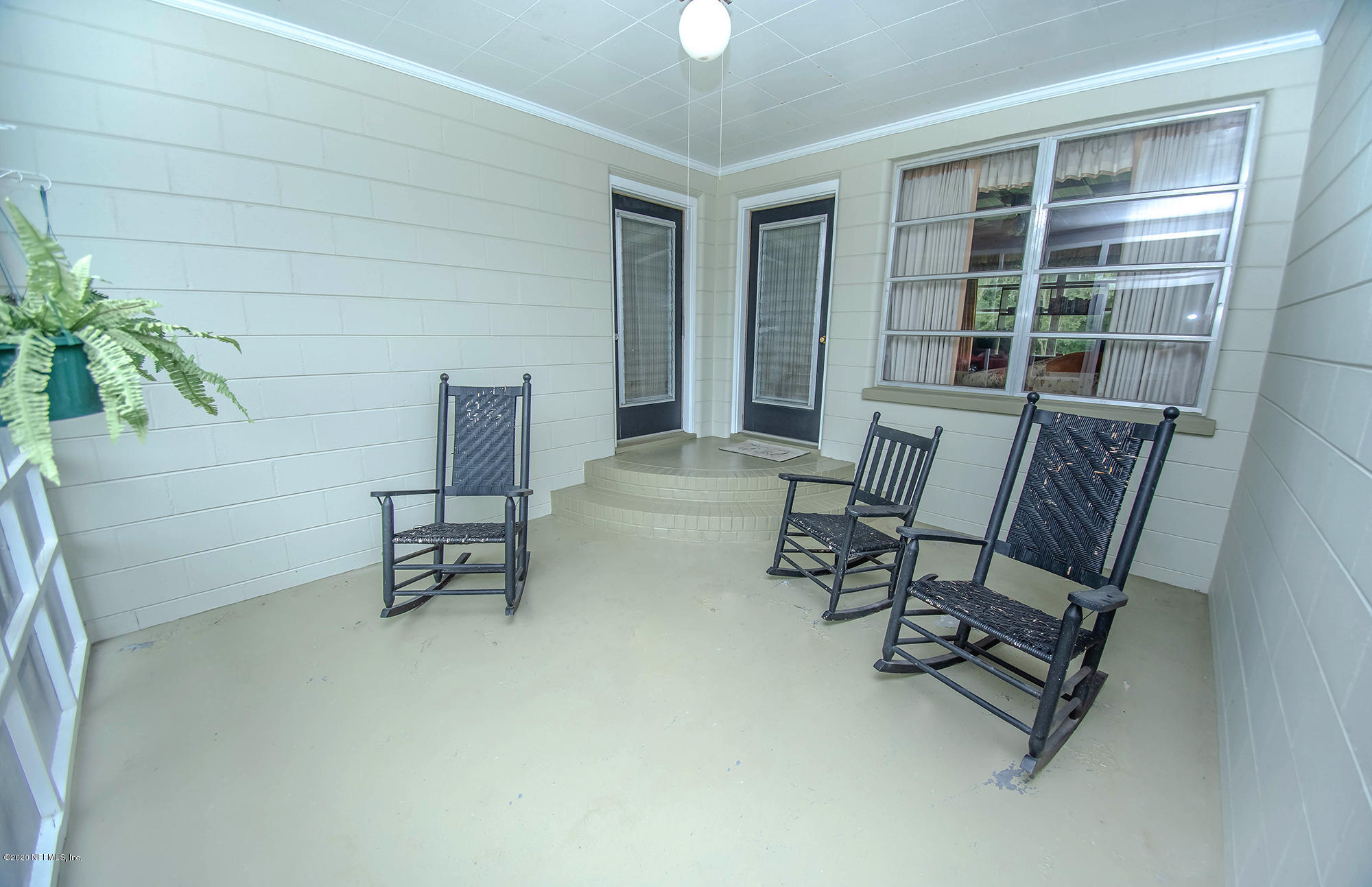 281105 Trigg Road Hilliard, FL 32046 - Photo 9 of 41 a view of a room with furniture and a window