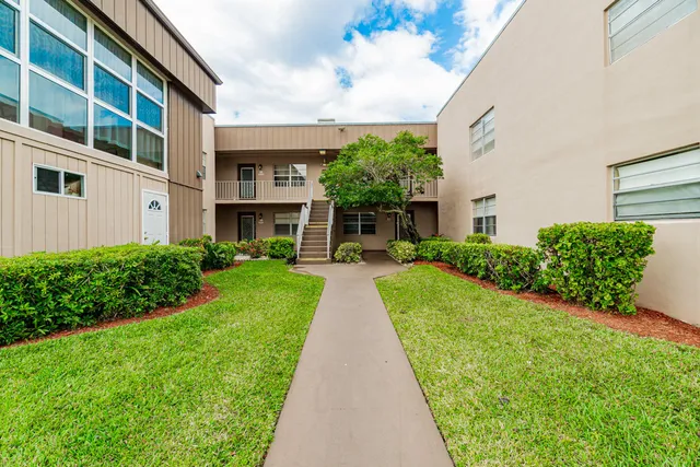 a view of building with yard