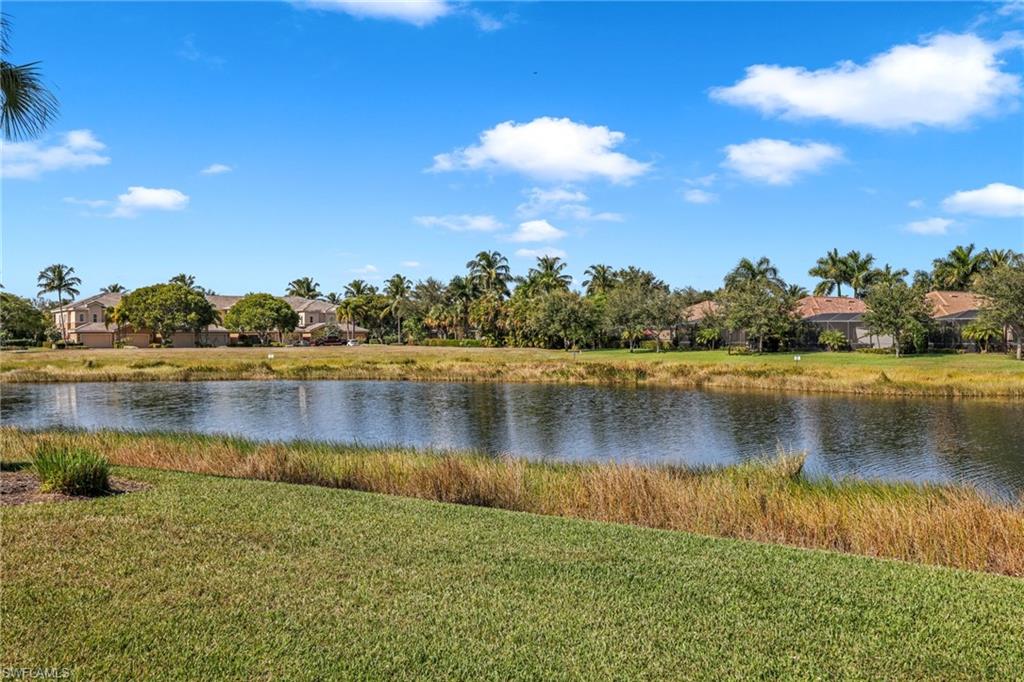 3159 Serena Lane, Unit 102 Naples, FL 34114 - Photo 19 of 42 a view of a lake
