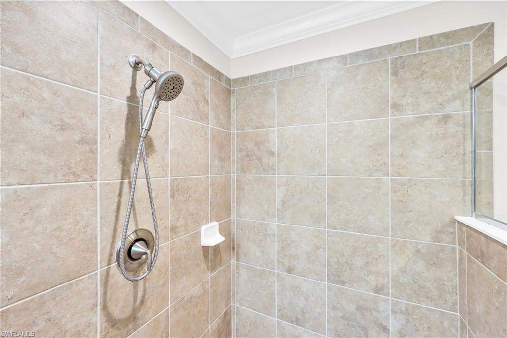 3159 Serena Lane, Unit 102 Naples, FL 34114 - Photo 28 of 42 a bathroom with a shower