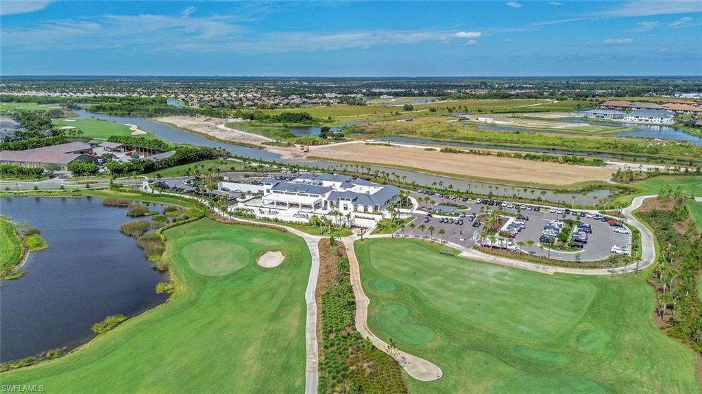3159 Serena Lane, Unit 102 Naples, FL 34114 - Photo 36 of 42 a view of a ocean with beach