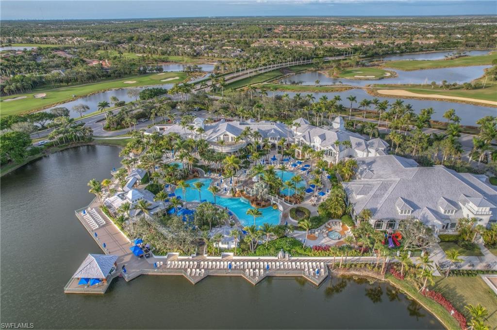 3159 Serena Lane, Unit 102 Naples, FL 34114 - Photo 37 of 42 an aerial view of ocean and residential houses with outdoor space