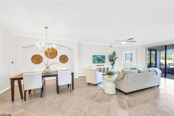 a living room with furniture and a table