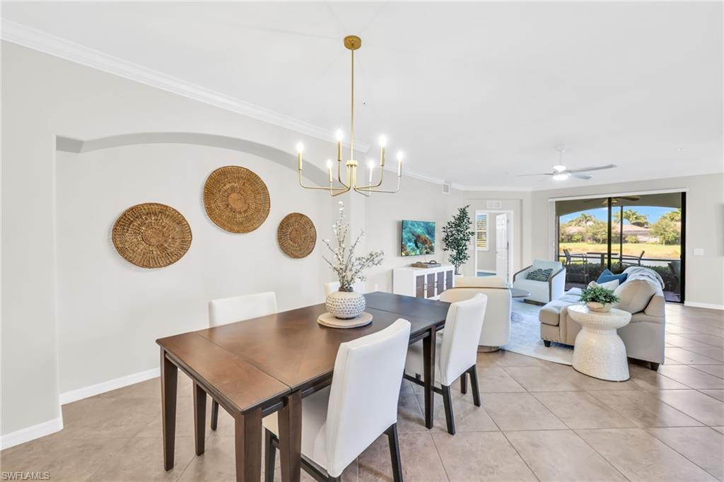 3159 Serena Lane, Unit 102 Naples, FL 34114 - Photo 5 of 42 a view of a dining room and a large window