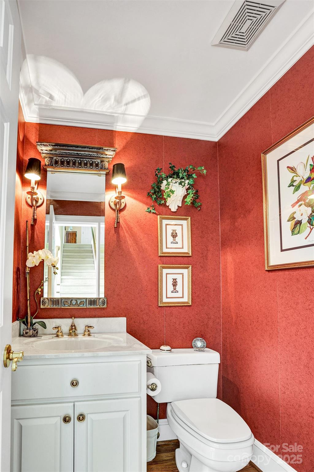 25683 April Lane Albemarle, NC 28001 - Photo 18 of 42 a bathroom with a toilet sink and mirror