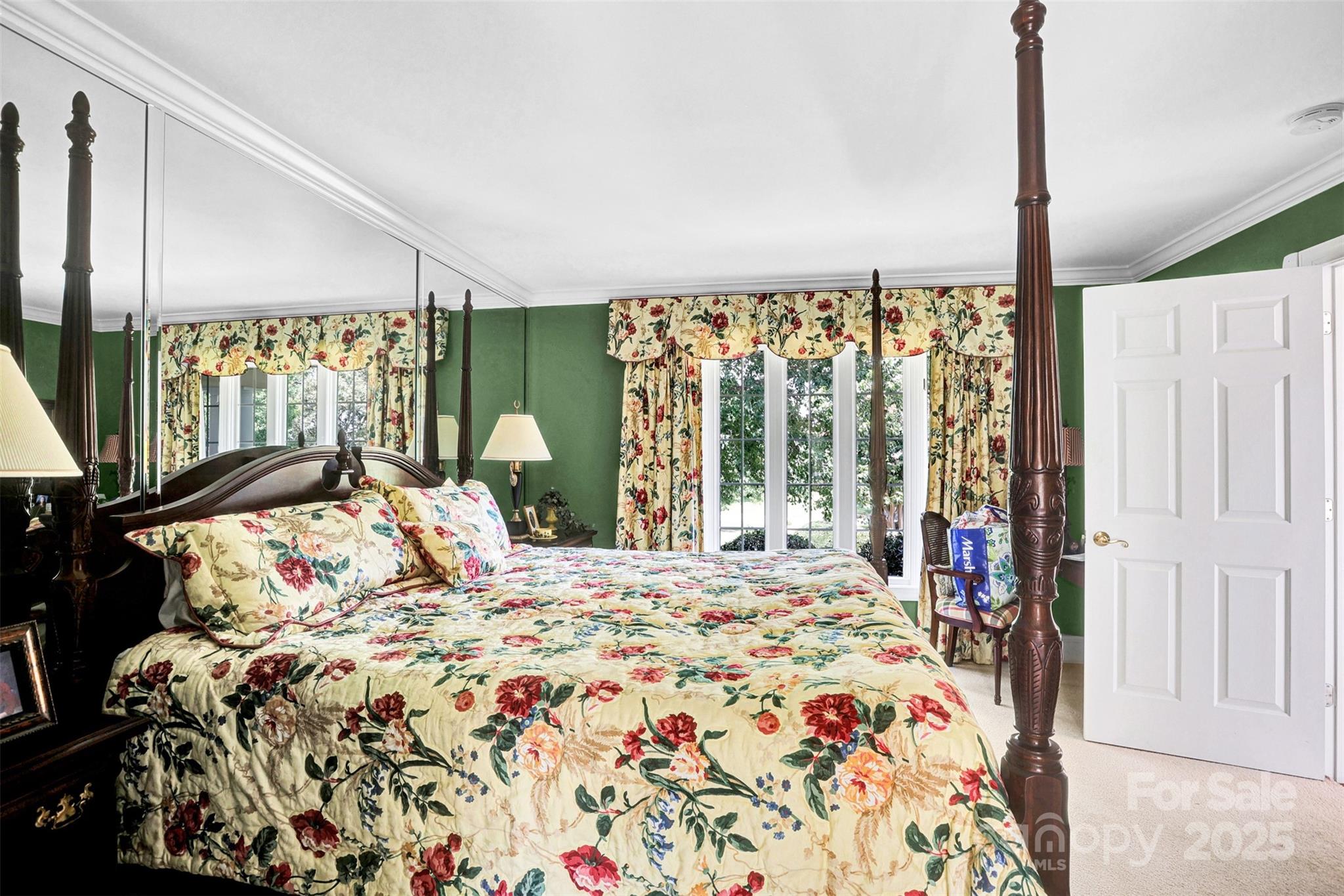 25683 April Lane Albemarle, NC 28001 - Photo 20 of 42 a bed sitting in a bedroom next to a window