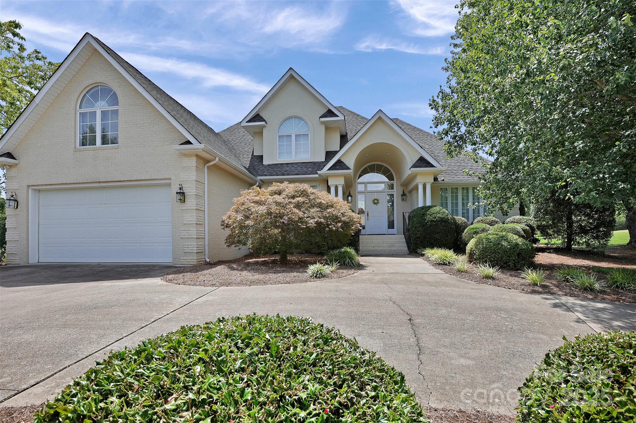 25683 April Lane Albemarle, NC 28001 - Photo 2 of 42 a front view of a house with a yard