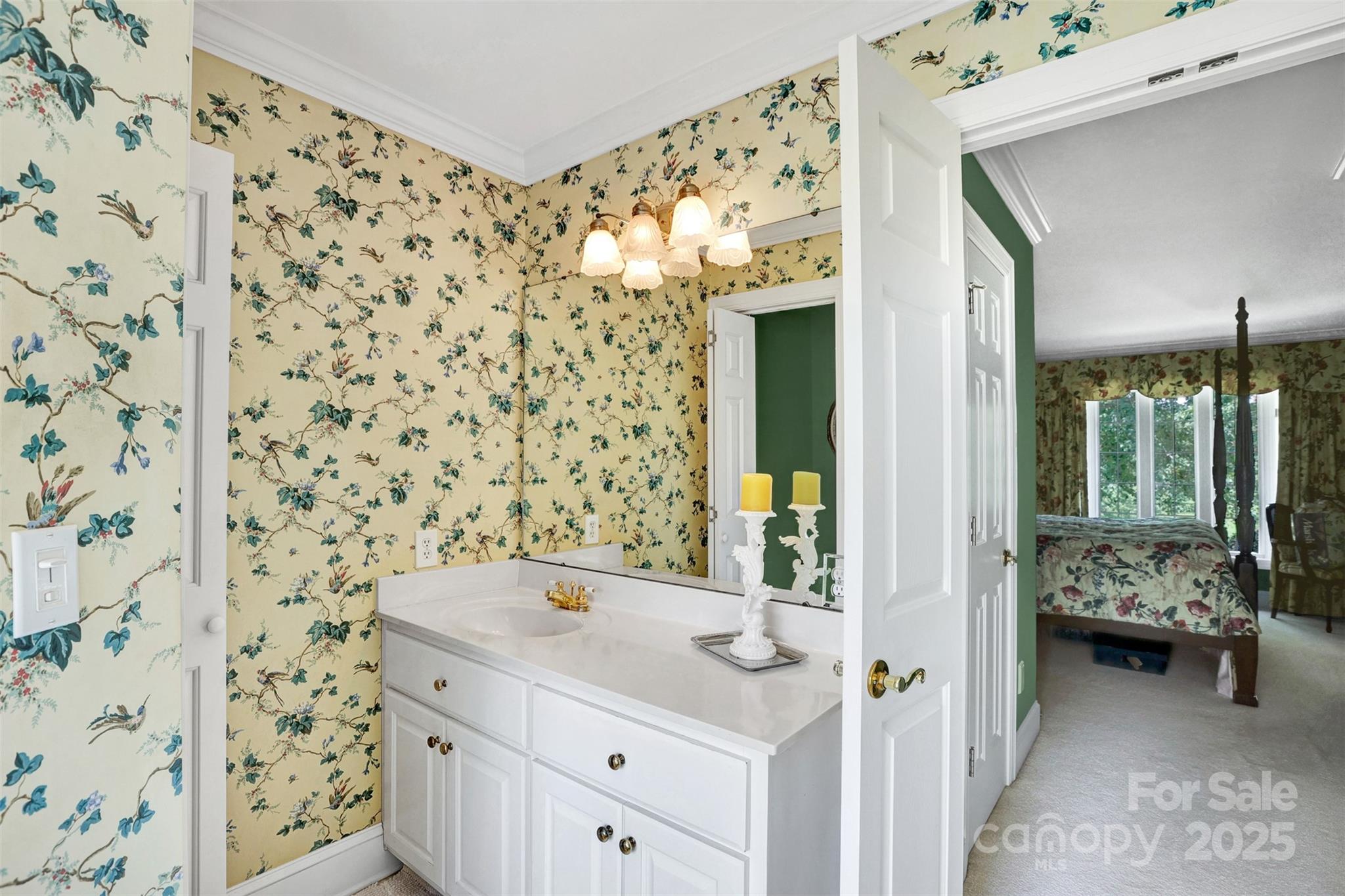 25683 April Lane Albemarle, NC 28001 - Photo 23 of 42 a bathroom with a sink and a mirror