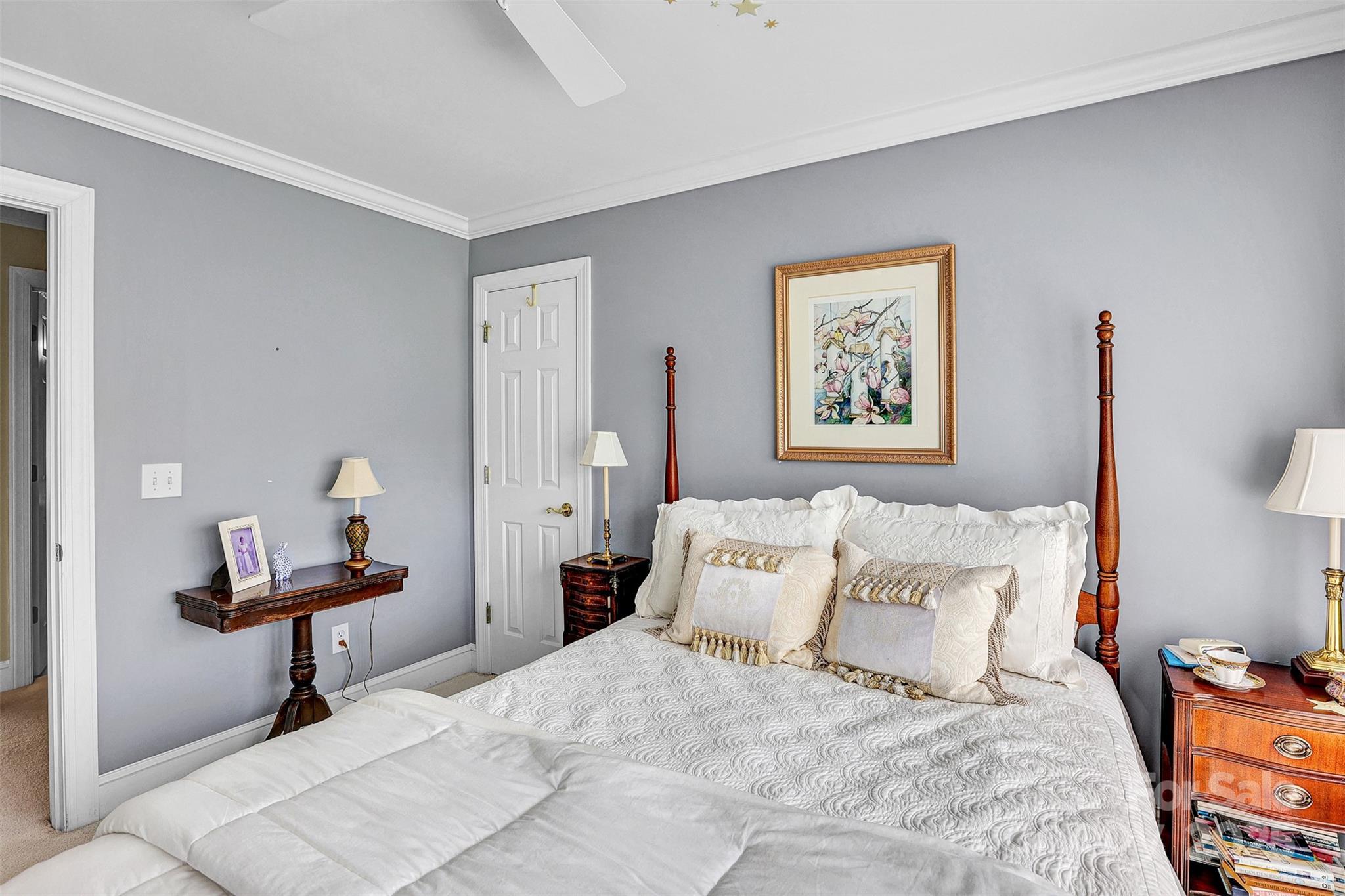 25683 April Lane Albemarle, NC 28001 - Photo 26 of 42 a bedroom with a bed and a painting on the wall