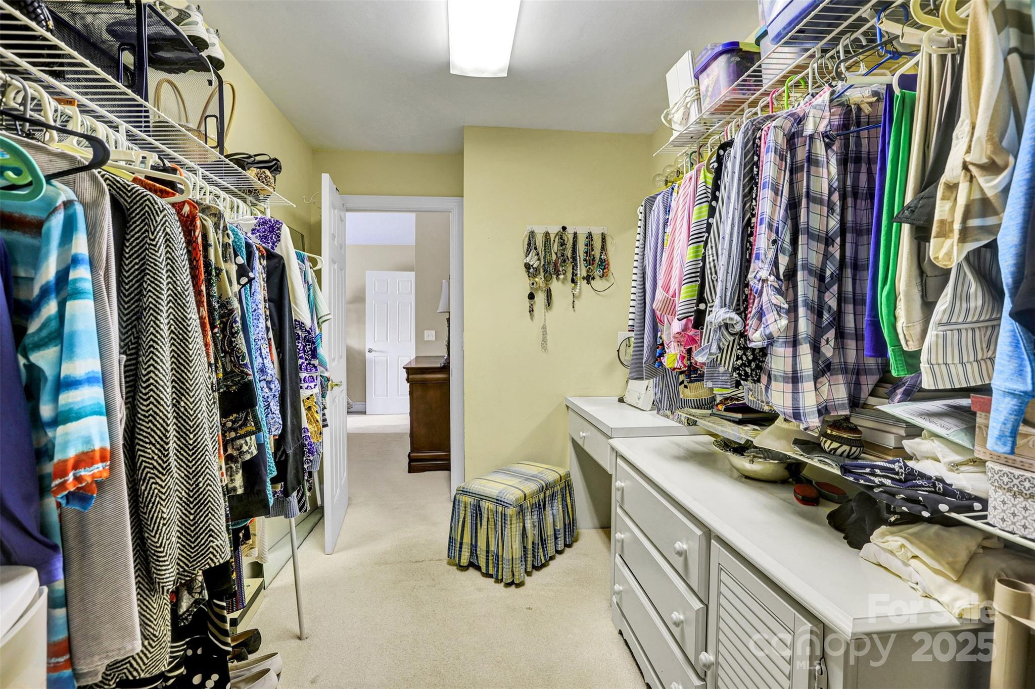 25683 April Lane Albemarle, NC 28001 - Photo 30 of 42 a view of walk in closet with clothes