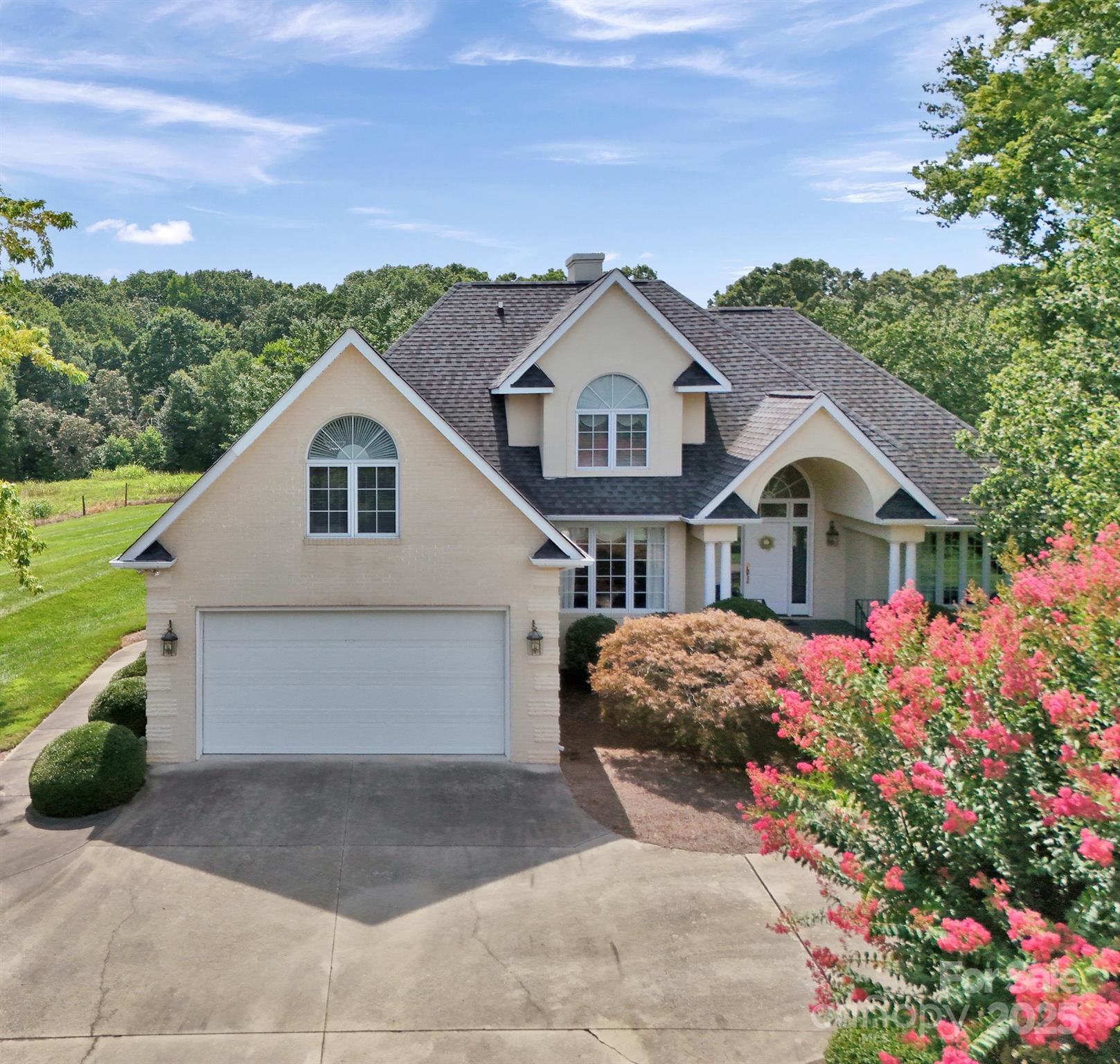 25683 April Lane Albemarle, NC 28001 - Photo 38 of 42 a front view of a house with a yard and garage