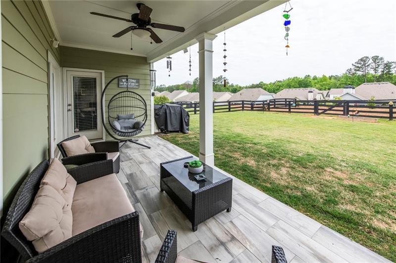 98 Heritage Pointe Drive Villa Rica, GA 30180 - Photo 15 of 48 a view of a chairs and table in the balcony