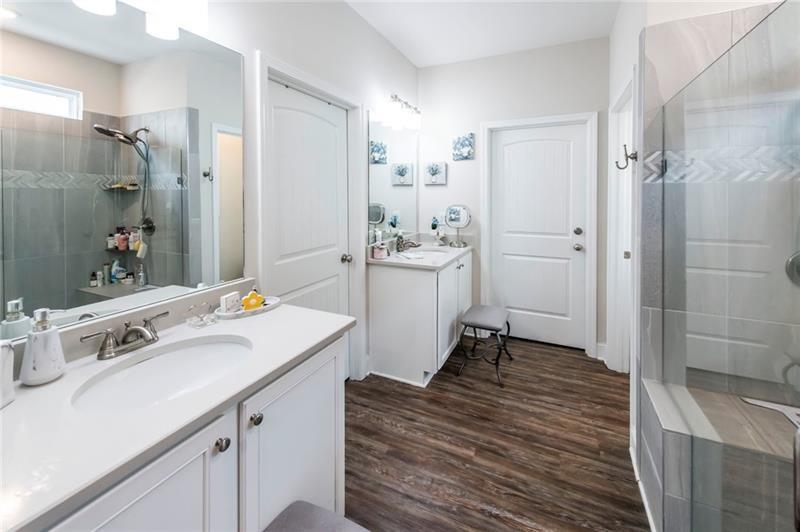 98 Heritage Pointe Drive Villa Rica, GA 30180 - Photo 29 of 48 a room with a sink and a refrigerator