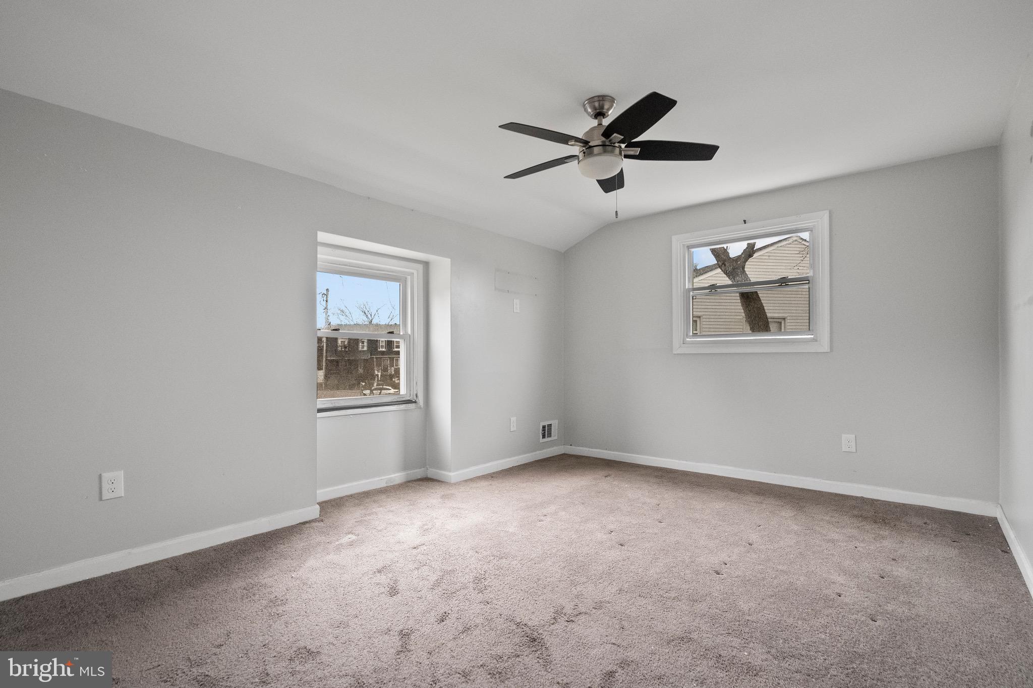 5709 Van Dyke Road Baltimore, MD 21206 - Photo 16 of 25 a view of an empty room with a window