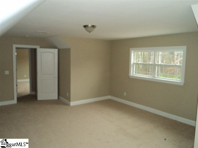 101 Springwater Court Easley, SC 29642 - Photo 21 of 23 Shed dormer with double windows adding extra heated square footages as well natural light!