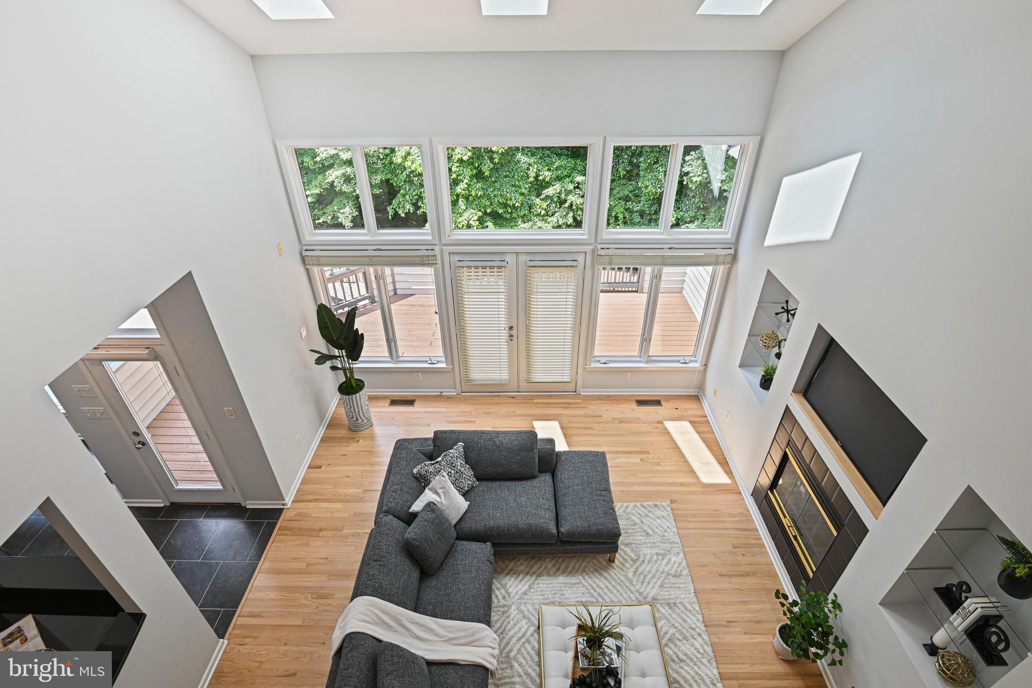 11217 Bright Pond Lane Reston, VA 20194 - Photo 32 of 72 View of family room from upper level