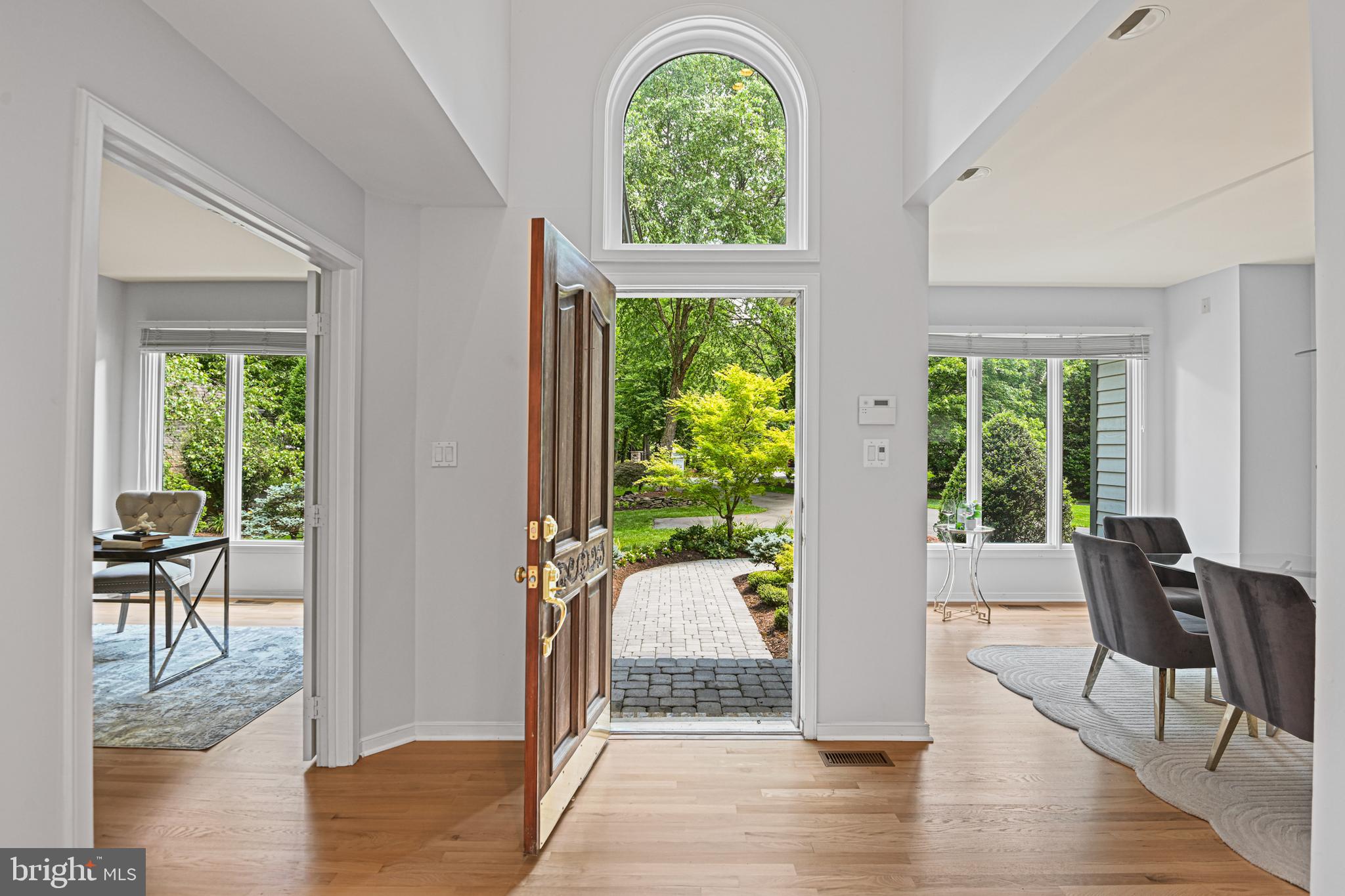 11217 Bright Pond Lane Reston, VA 20194 - Photo 5 of 72 The dining room on one side & office/LR on other