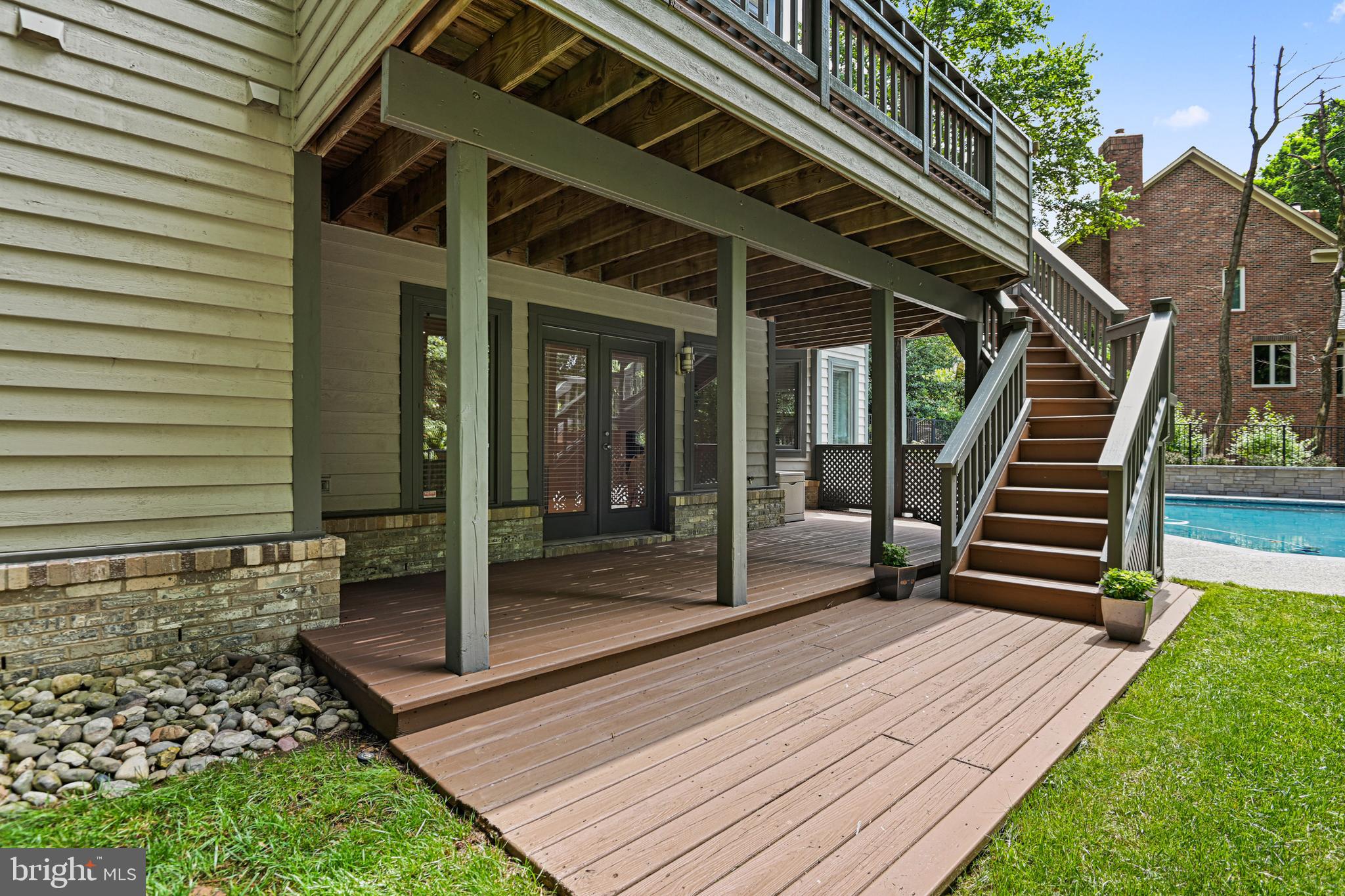 11217 Bright Pond Lane Reston, VA 20194 - Photo 56 of 72 Walk down to LL deck and the pool