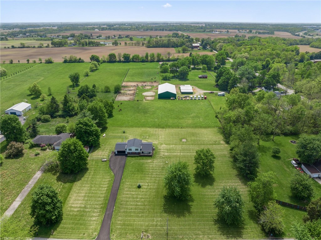 1353 Foust Road Xenia, OH 45385 - Photo 9 of 50 Expansive green acreage surrounds this tranquil property, perfect for rural living.