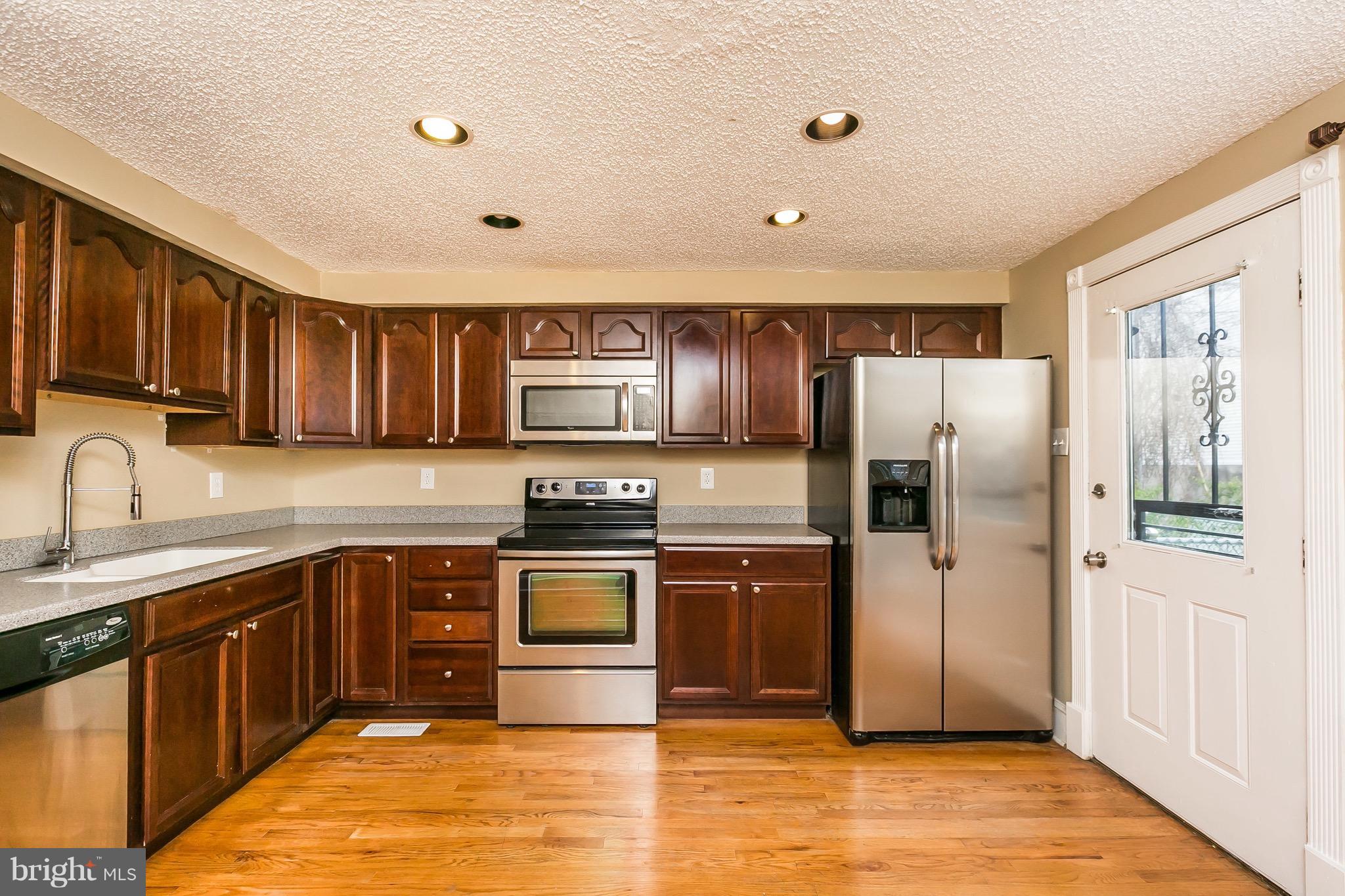 810 Carroll Street Baltimore, MD 21230 - Photo 10 of 30 Kitchen With Stainless Steel Appliances