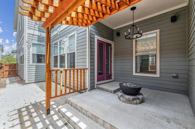 a view of an outdoor space with deck and patio