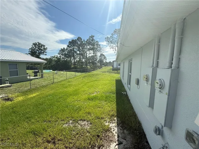 a view of an chairs and table in the balcony