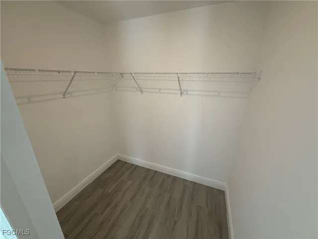 a view of a room with racks on the wall