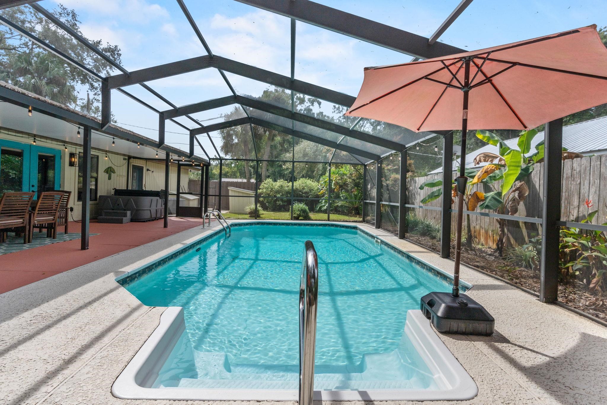 117 Seminole Road St. Augustine, FL 32086 - Photo 32 of 47 a view of a swimming pool with a patio