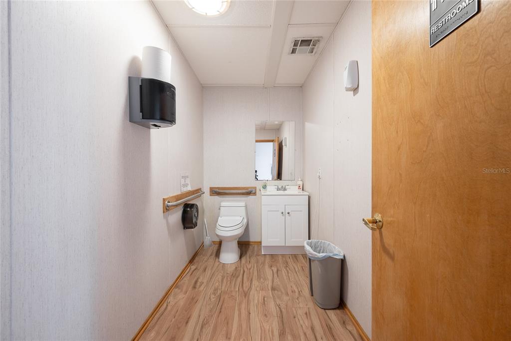 1813 North Dean Road Orlando, FL 32817 - Photo 16 of 35 a bathroom with a sink toilet and shower
