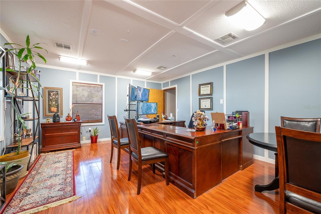 1813 North Dean Road Orlando, FL 32817 - Photo 24 of 35 a view of a dining room with furniture window and wooden floor