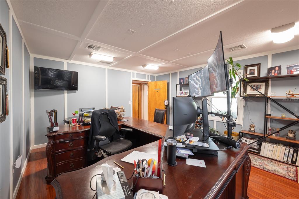 1813 North Dean Road Orlando, FL 32817 - Photo 26 of 35 a living room with furniture and a flat screen tv