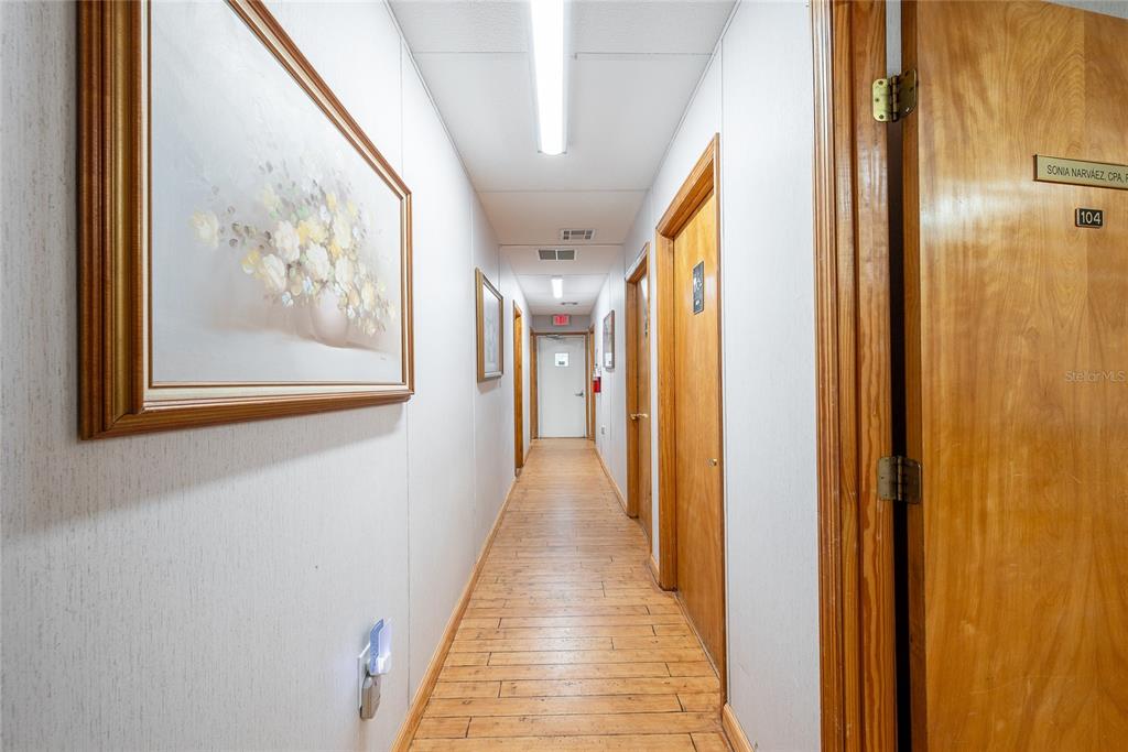 1813 North Dean Road Orlando, FL 32817 - Photo 30 of 35 a view of a hallway with wooden floor