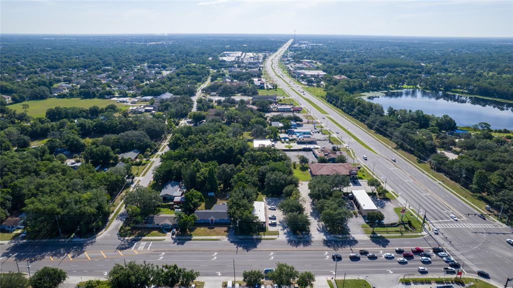 1813 North Dean Road Orlando, FL 32817 - Photo 31 of 35 an aerial view of a residential houses with outdoor space and trees